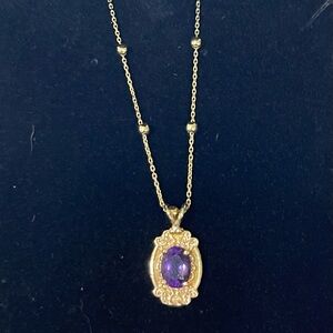 Gold-Tone Necklace with Purple Oval Gemstone Pendant